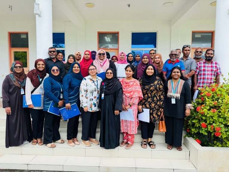 Participants and facilitator gather for a group photograph at MNU Hithadhoo Campus