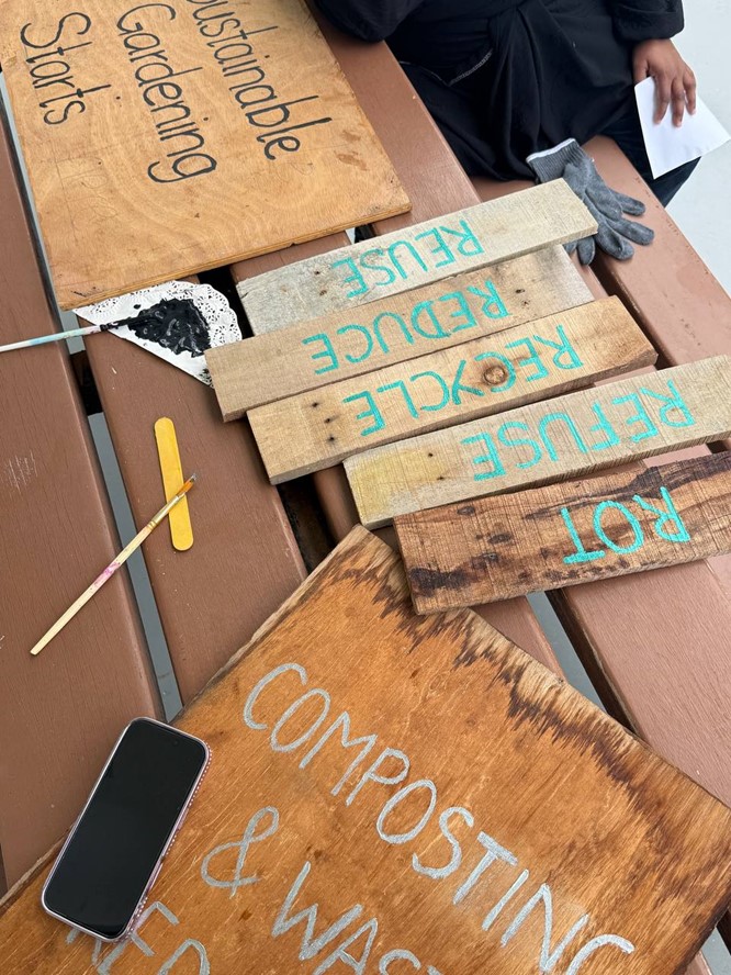 Signage created using recycled materials for Compost and waste reduction project